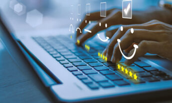 woman hands on a laptop