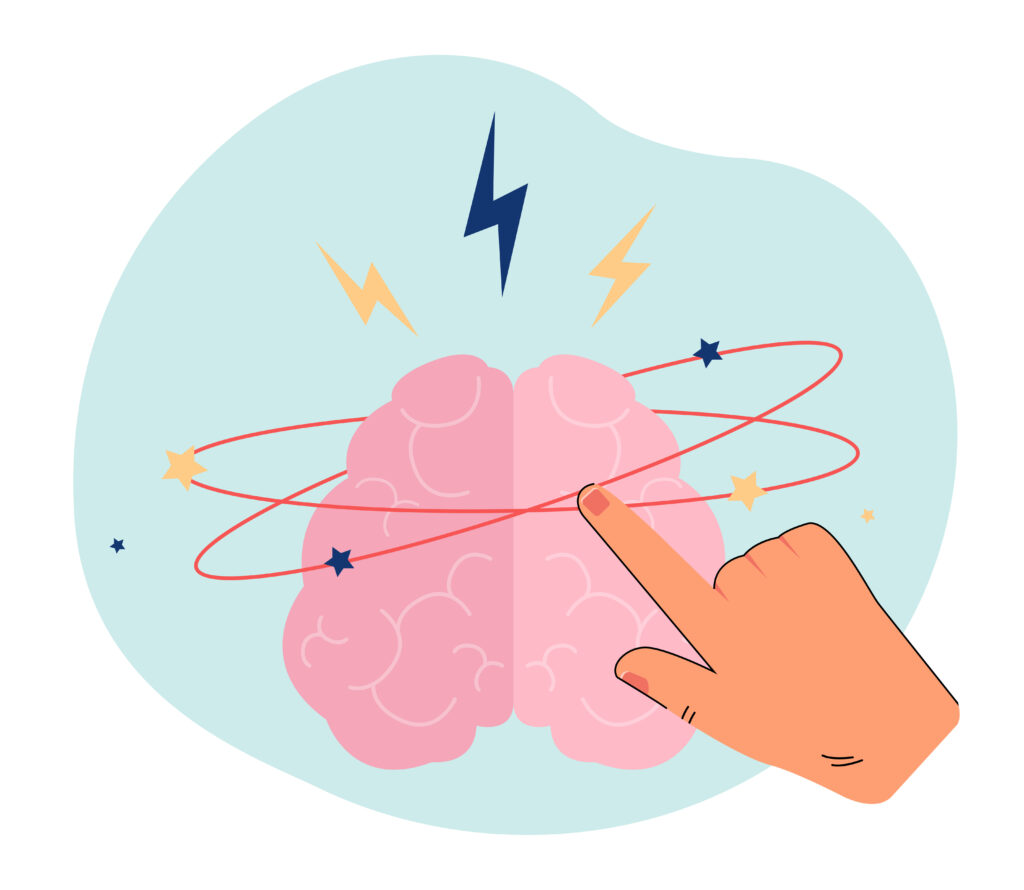 Hand pointing at a human brain.