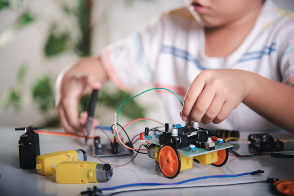 A child learning through AI and programming